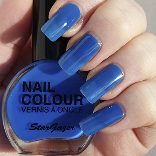 Stargazer Neon Blue UV reactive nail polish. Bright nail polish that glows under uv neon light.