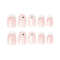 Albiuev 24PCS Short False Nails with Glue Stickers,Almond Full Cover Acrylic Press on Nails no Glue, White Simple Flower French Fake Nails for Women and Girls Nail Art.