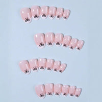 NLFOX 24pcs Short False Nails with Glue - French Tip Press on Nails Almond - Black Bow-Tie Stick on nails French Tip - Nude Fake Nails Glue on - Elegant Almond nail Tips Full Cover for Women Girls Long Last