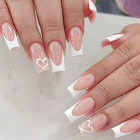 Shengqialun Pink Press on Nails, Long Coffin False Nails - French Tip Pink & White Fake Nail with Heart Accents, 24pcs Full Cover Stick on Nails with Glue, Glossy Elegant Press-Ons for Parties