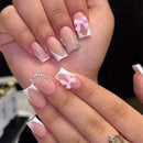 Dream Aurora 24 Pcs French False Nails White Tip,Press on Nails Medium Coffin Shape Bow Fake Nails with Design Rhinestones Glue on Nails French Nail Tips False Nails Supplies Full Cover Glossy Acrylic Nails