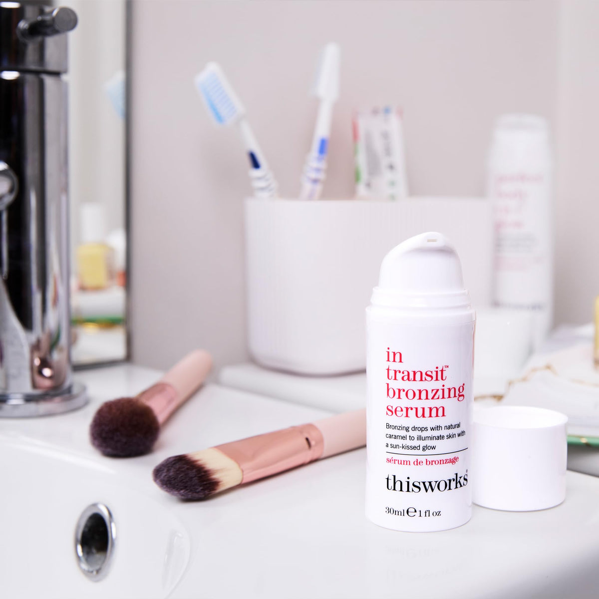 This Works - In Transit Bronzing Serum, Instant Tanning Drops for Face (30ml) Add to Moisturiser or Serum for a Natural Glow, Fake Tan