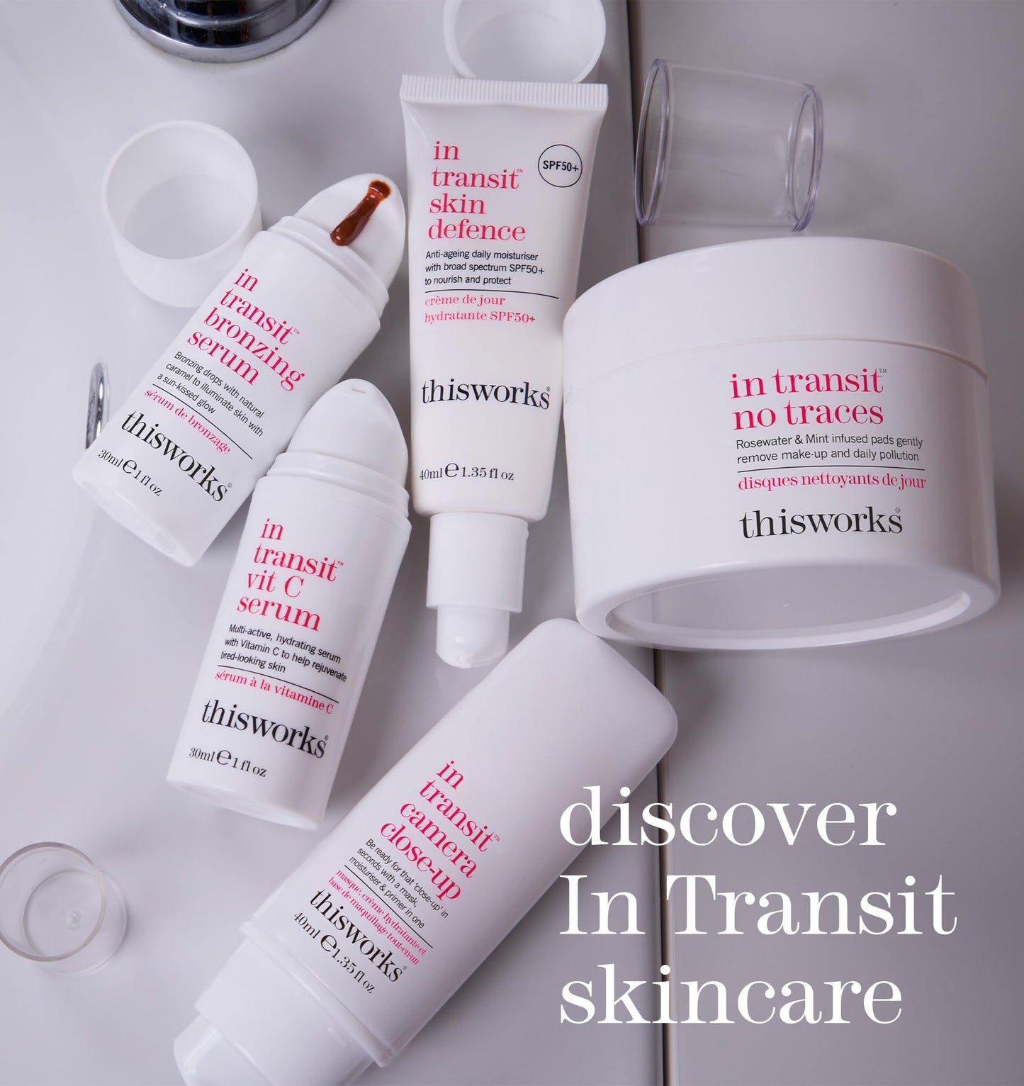 This Works - In Transit Skin Defence SPF50+ Face Moisturiser (40ml) with Hyaluronic Acid, Vitamin E and Antioxidants - Anti-Aging Daily Face Sunscreen Lotion for Broad-Spectrum UVA/UVB Protection