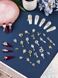 36 Pcs Luxury Nail Charms, TEBANKU 3D Dangle Nail Art Rhinestones Gold Silver Heart Pearl Crystal Gems Nail Diamond for Girl Women DIY Nail Design Craft Jewelry Making