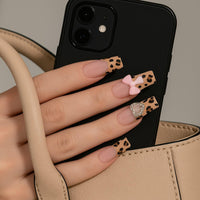 Generic Long Square Fake Nails with Leopard Print & Pink Bow Designs - 24PCS Glossy Reusable Artificial Nail Tips for Women, Nude Pink Gradient Coffin Style Acrylic for Daily Wear and Special Occasions
