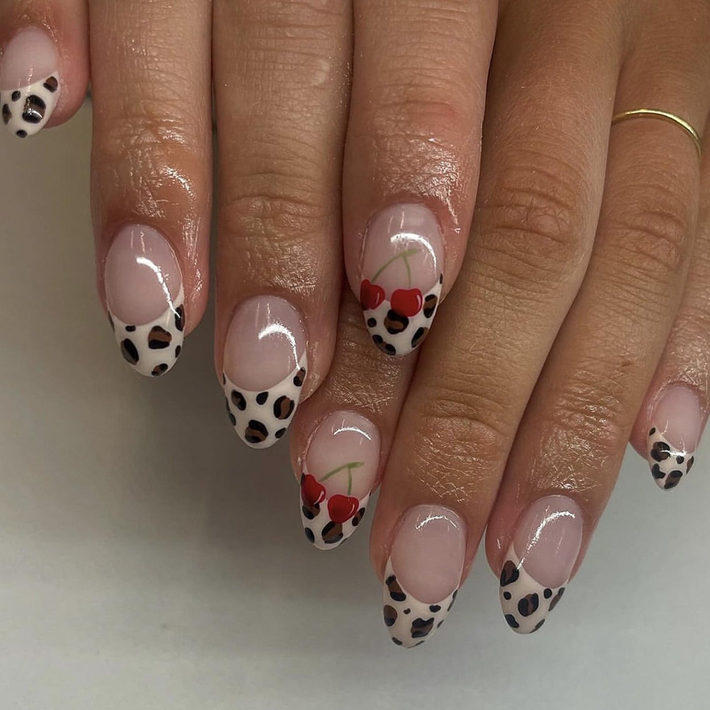 NLFOX 24pcs Short Almond Press on Nails - Leopard Print French Tip Design With Glue - 12 Sizes Cherry Pattern Full Cover Stick on for Women Girls