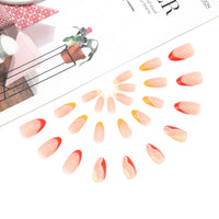 Sethexy Swirl Almond False Nails Orange French Stiletto Stick on Nails Wave Line Fake Nails 24Pcs Acrylic Art Press on Nail Tips for Women and Girls