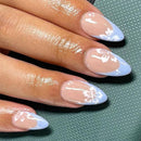 Cosmeria 24 Pieces Press on Nails, Blue French Tips, Medium Length Almond Shape Fake Nails with White Floral Design, Glossy Stick on Nails