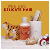 SHEA MOISTURE SheaMoisture's Mango and Carrot Extra-Nourishing Shampoo gently cleanses and detangles children's fine and delicate hair. Helps nourish and strengthen hair, while protecting against breakage.