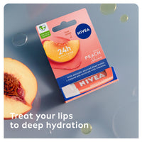 NIVEA Peach Shine Lip Balm (4.8g), Flavoured Lip Balm with Shea Butter, Natural Oils and Vitamins, Provides 24h Moisture and a Coral Shine, Vegan Lip Care Formula