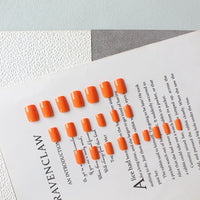 SXVME Orange False Nails Short Medium Square, Gel Press on Nails Coffin Medium Glossy Fake Nails Set Solid Color Acrylic Nail Natural Fit Reusable Stick on Nail for Women Daily Wear, in 24 Pcs